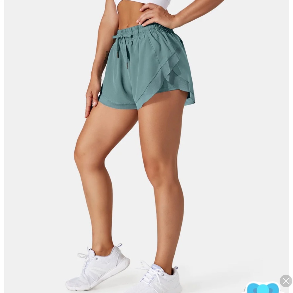 Halara drawstring shorts in Blue Spruce
